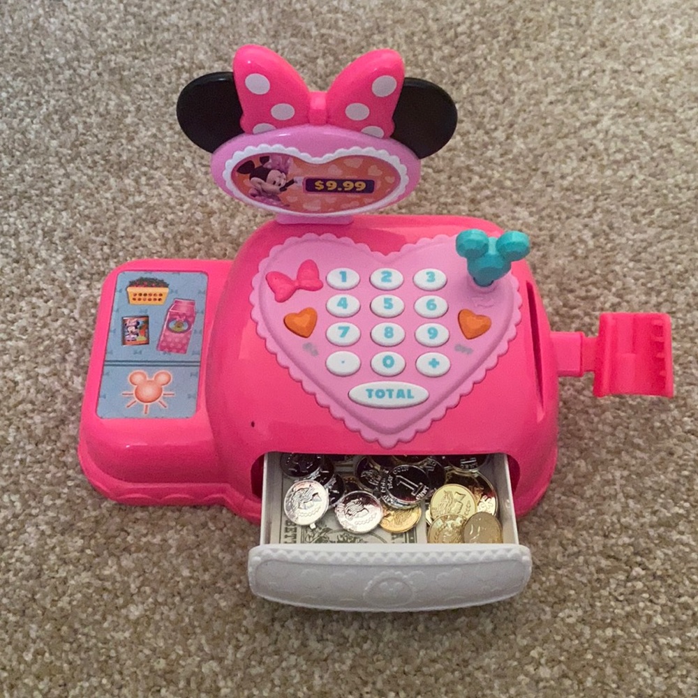 Minnie Mouse working cashing register